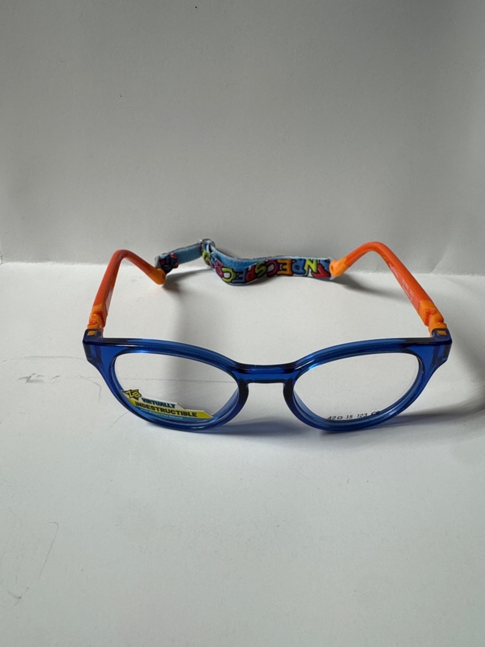 liberty Blue Frame Glasses with Orange Temples and Colorful Strap